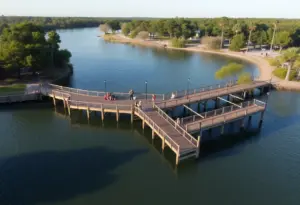 People fishing from the new pier at Fleming Park