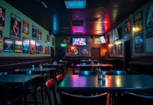 Inside the Greene Turtle sports bar with empty furniture and promotional decor