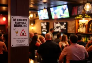 Bar patrons in Towson enjoying drinks with a sign promoting responsible drinking and ID checks.
