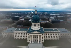 Aerial view of Maryland State Capitol in Annapolis with cloudy skies