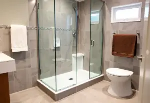 Modern accessible bathroom featuring walk-in shower for seniors