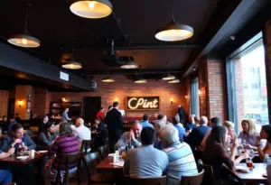 Inside view of The Point restaurant in Towson with customers gathered and enjoying their meals.