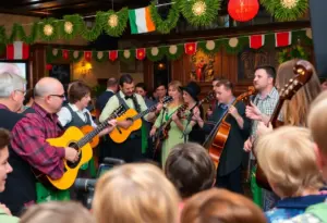 A group of musicians performing traditional Irish music at a concert with an enthusiastic audience.